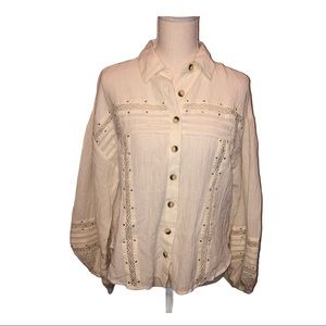 Free People cream colored blouse, size small.